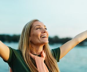 Person practicing somatic techniques outdoors