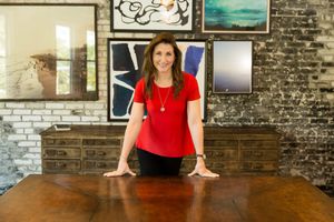 Traci Dobrev at her desk